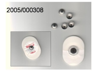 Metallfarbene Scheibe mit einem Durchmesser von ca. 10 mm und einer Dicke von ca. 0,2 mm, mittig mit einem 3,9 mm starken und 2,3 mm hohen, zylindrischen, hohlen Zapfen ausgestattet;
Sensorelemente für EKG-Elektroden.