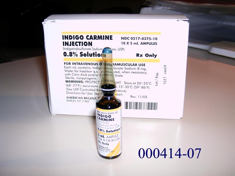 Pharmazeutische Zubereitung (diagnostische Reagenz) in Form einer dunkelblauen, klaren, wässrigen Lösung von Indigocarmin, eines Lebensmittelfarbstoffes (Indigotin I; Dinatriumsalz der 3,3´-Dioxo-2,2´-biindolyliden-5,5´-disulfonsäure; Indigosulfonsaures Natrium); aufgemacht in einem etikettierten, weißen Karton, 2 Kartonhalterungen zu jeweils 5 Stück farblose, etikettierte Glasampullen mit Sollbruchstellen á 5 ml sowie einen Beipacktext enthaltend.