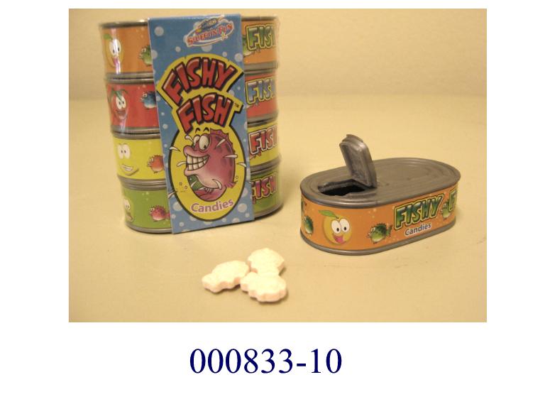Je nach Geschmacksrichtung/Packung verschiedenfarbige, fischförmig stilisierte, nicht kakaohaltige, nicht alkoholhaltige Komprimate (Länge: ca. 13 mm, Breite: max. ca 9 mm, Dicke: ca. 6 mm) mit süß-säuerlichem und zugleich aromatischem Geschmack; im Wesentlichen bestehend aus Zucker (Saccharose, wenig Glucosesirup und Maltodextrin), Genusssäure, einem Trennmittel, Aroma und Farbstoffen; mit Gehalt an: Milchfett: 0,00 GHT; Milchprotein: 0,00 GHT; Stärke/Glucose: weniger als 5 GHT; Saccharose/Invertzucker/Isoglucose: mehr als 70 GHT; aufgemacht in einem als Fischdose stilisierten, länglich-ovalen Kunststoffbehältnis mit seitlich angebrachtem, buntbedrucktem Schleifbandetikett und einem aufklappbaren Verschluss mit einem Eigengewicht des Inhaltes je Packung von 8,6 g; jeweils 4 dieser Behältnisse sind, umhüllt von einer buntbedruckten Papierschleife, übereinander gestapelt (Gesamteigengewicht: 34,2 g).