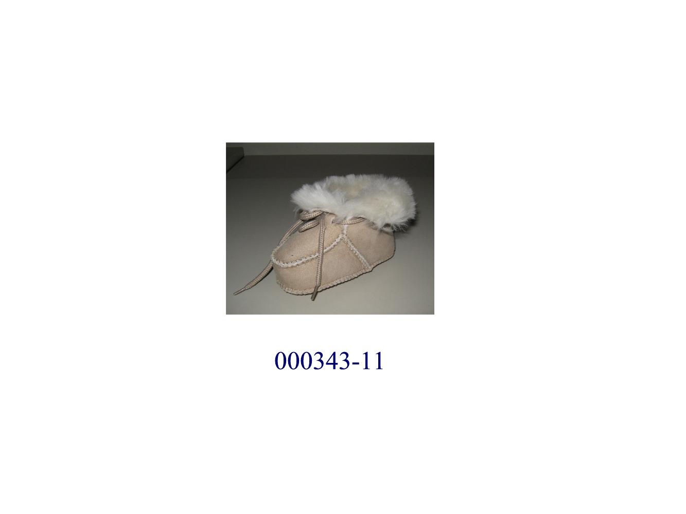 Schuh in Form eines Baby-Schuhes
- mit geschlossenem Blatt und zum Schnüren, die Knöchel, nicht jedoch die Wade bedeckend,
- mit einer Laufsohle und einem Obermaterial aus Pelzfell (laut Firmenangaben Schaffell), wobei das Fell den Innenteil und die gegerbte Haut den Außenteil des Schuhes bilden,
- Länge der Innensohle weniger als 24 cm.
