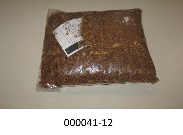 Trockener, hellgelber bis hellbrauner, unverarbeiteter, nicht entrippter Tabak der Sorte "light air cured" (Burley-Tabak); Pflanzenschnitt mit krautigem Geruch nach Tabak, ohne Rauchgeruch; in Verpackungen zu 30 kg; kein rauchfertiger Tabak der Pos. HS 2403.
(Abbildung siehe Anhang),

„Tabak, unverarbeitet, nicht entrippt, (light-air-cured) Burley“.