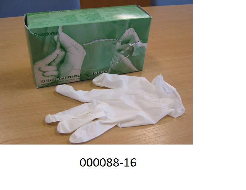 Fingerhandschuh in Form von Einweg-Schutzhandschuhen
- bestehend aus einem dünnen und dehnbaren Weichkautschuk,
- einfärbig und gepudert, 
- verpackt in einer bunt bedruckten Faltkartonschachtel (nicht steril).
(Abbildung siehe Anlage)