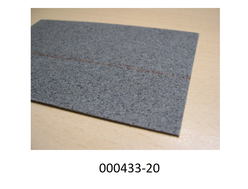 Reibungsbelag in Form von Reibpapier,
- bestehend aus einem kunststoffgebundenen Vlies auf Basis von Kohlenstofffasern und Aramidfasern,
- mit einer Dicke von weniger als 20mm, zur Verwendung bei der Herstellung von Reibungskomponenten,
- nicht montiert.
 (Abbildung siehe Anlage)