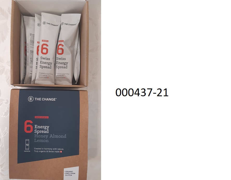 Lebensmittelzubereitung in Form einer braunen, zähen, klebrigen, schwach nussartig riechenden und ebenso, sowie fettig schmeckenden, nicht kakaohaltigen, nicht alkoholhaltigen Masse, im Wesentlichen bestehend aus Mandelbutter, Honig und (lt. Packungsaufdruck) Zitronensaftkonzentrat, Steinsalz und Zimt; mit Gehalt an: Milchfett: 0,0 GHT; Milchprotein: 0,0 GHT, Stärke/Glucose: weniger als 5 GHT; Saccharose/Invertzucker/Isoglucose: mehr als 5 GHT, jedoch weniger als 30,0 GHT; aufgemacht in einem Karton mit buntbedruckter Kartonschleife, 10 buntbedruckte, längliche Verbundfoliensäckchen mit Siegelrand zu je 30 g enthaltend; das Erzeugnis dient als Ergänzungslebensmittel und soll mit Wasser oder einem anderen Getränk eingenommen/hinuntergespült werden.