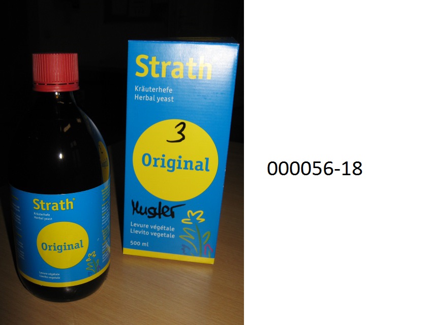 Braunes, tr?bes, mit hefeartigem Geruch und ebensolchen, sowie honigartigem, sehr s??em Geschmack, unmittelbar trinkbares, alkoholhaltiges, nicht verbrauchsteuerpflichtiges, nicht sch?umendes, gegorenes Getr?nk, in Beh?ltnissen von 2 Liter oder weniger, im Wesentlichen aus Wasser, G?rungsalkohol, Zucker (Glucose und Fructose) und lt. Etikette aus plasmolysierter Kr?uterhefe (vergorene und verfl?ssigte Hefe mit Kr?utermischung), Malzextrakt, Orangensirup und Honig; aufgemacht in einem buntbedruckten Karton, eine etikettierte Originalbraunglasflasche mit Schraubverschluss zu 500 ml enthaltend.