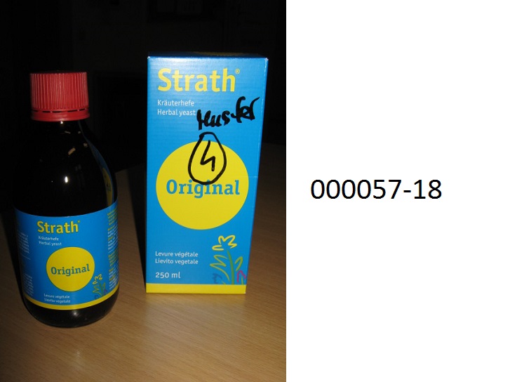 Braunes, tr?bes, mit hefeartigem Geruch und ebensolchen, sowie honigartigem, sehr s??em Geschmack, unmittelbar trinkbares, alkoholhaltiges, nicht verbrauchsteuerpflichtiges, nicht sch?umendes, gegorenes Getr?nk, in Beh?ltnissen von 2 Liter oder weniger, im Wesentlichen aus Wasser, G?rungsalkohol, Zucker (Glucose und Fructose) und lt. Etikette aus plasmolysierter Kr?uterhefe (vergorene und verfl?ssigte Hefe mit Kr?utermischung), Malzextrakt, Orangensirup und Honig; aufgemacht in einem buntbedruckten Karton, eine etikettierte Originalbraunglasflasche mit Schraubverschluss zu 250 ml enthaltend.