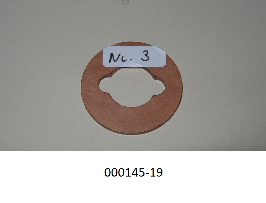 Isolierteil (Ware aus Pressspan),
- eine 2 mm dicke, harte, steife Scheibe mit einem Durchmesser von 32 mm und einer mittig liegenden, ovalen Öffnung mit zwei "Ohren", aus zu 100% unter hohem Druck verpresstem Zellstoff,
- zur elektrischen Isolation bei Isolatoren.
(Abbildung siehe Anlage)

"Isolierteile, ganz aus Isolierstoffen (Papierhalbstoff) für elektrische Maschinen, Apparate, Geräte oder Installationen".
