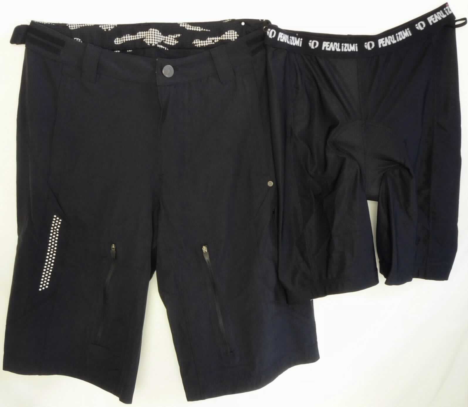 Zwei miteinander verbundene Kleidungsstücke, bestehend aus einer kurzen Hose aus Geweben (außen) und einer kurzen Unterhose aus Gewirken (innen), sog. Radsporthose mit Innenhose, 11111308 Launch Short,
Größe M, Foto siehe Anlage,
- beide Kleidungsstücke sind durch Druckknopfriegel am Taillenbund miteinander verbunden, können aber 
  auch separat getragen werden,
- kurze Hose:
-- aus ca. 0,5 mm dicken, einfarbigen Geweben aus laut Antrag 94 % Nylon und 6 % Elasthan (synthetische  
   Chemiefasern),
-- in der Taille abschließend; mit einem ca. 4 cm breiten Bund mit Gürtelschlaufen, seitlich mittels Klettriegel zu 
   verengen,
-- vorn mit einer Öffnung mit Reißverschluss, verdeckt von einer Patte mit Knopfverschluss von links 
   über rechts (Männerkleidung),
-- vorn mit drei eingesetzten Taschen mit Reißverschluss, an den Hosenbeinen mit zwei unterlegten Öffnungen mit 
   Reißverschluss, 
-- mit kurzen Hosenbeinen, die nicht die Knie bedecken (Seitenlänge: ca. 63 cm),
-- an den Beinabschlüssen durch Umschlagen und Festnähen gesäumt.

"Kurze Hose, aus Geweben, für Männer, aus synthetischen Chemiefasern"