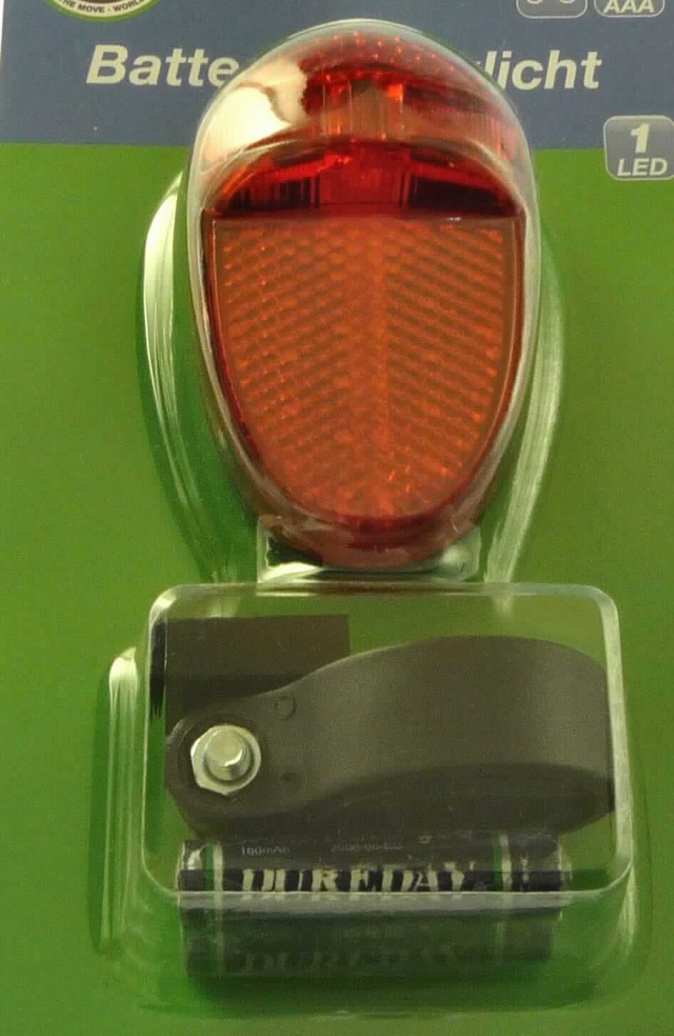 Fahrradrücklicht Art. Nr. 40.013
- aus einer Leuchtdiode (Dauerlicht aussendend) in einem spezifisch geformten Kunststoffgehäuse 
  mit rotem Reflektor, Ein-/Ausschalter, Batteriefach und passgenauem Befestigungsclip zum Einstecken 
  in eine Halterung sowie einer separat beigelegten Kunststoffhalterung mit Aufnahmevorrichtung für die 
  Fahrradrückleuchte zur Montage am Fahrrad,
- in einer gemeinsamen Verkaufsverpackung mit flexiblen Kunststoffabschnitten zur Rutschhemmung und 
  zwei AAA-Batterien (Beipack).
(Abbildung s. Anlage)
Die Fahrradrückleuchte bestimmt den Charakter des Ganzen.

"Elektrisches Beleuchtungs- und Sichtsignalgerät von der für Fahrräder verwendeten Art, noch nicht 
 zusammengesetzt mit Kunststoffhalterung, in Warenzusammenstellung mit Beipack; Fahrradrückleuchte"