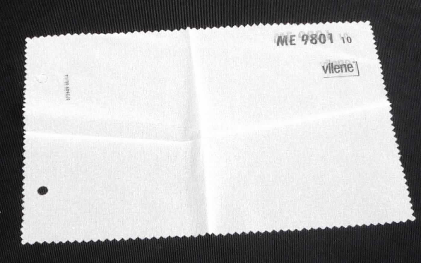 Gewebe, sog. Einlagenstoff für die Textilindustrie, Art. ME 9801 Farbe 10 - weiß, Foto siehe Anlage,
- als Meterware; laut Antrag mit einer Breite von 150 cm,
- laut Untersuchungsergebnis:
-- aus ungezwirnten, nicht hochfesten Garnen aus synthetischen Filamenten (laut Antrag: 100 % Polyamid),
-- mit Schmelzklebepunkten bedruckt.

"Gewebe aus Garnen aus synthetischen Filamenten, anderes als in den Unterpositionen 5407 10 bis 5407 30 
 genannte, mit einem Anteil an Filamenten aus Polyamiden von mehr als 85 GHT, bedruckt"