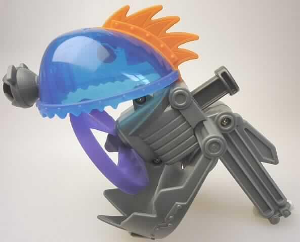 Bei dem "Fan Brainbot" aus der McDonald`s Aktion "Megamind 2010" handelt es sich um ein ca. 11 cm hohes, pistolenartig gestaltetes Spielzeug aus Kunststoff, das ein Gehirn (durchscheinender farbiger Kunststoff) darstellen soll. Der "Lauf" kann maulartig aufgeklappt werden. Darin befindet sich ein Ventilatorrad, das mittels Druckmechanik (Daumendruck) gedreht werden kann.
Die Ware ist in einem Polybeutel für den Einzelverkauf aufgemacht und dient der spielerischen Unterhaltung von Kindern.

Sie ist als "anderes als zuvor von der Position 9503 erfasstes Spielzeug, aus Kunststoff" einzureihen.
