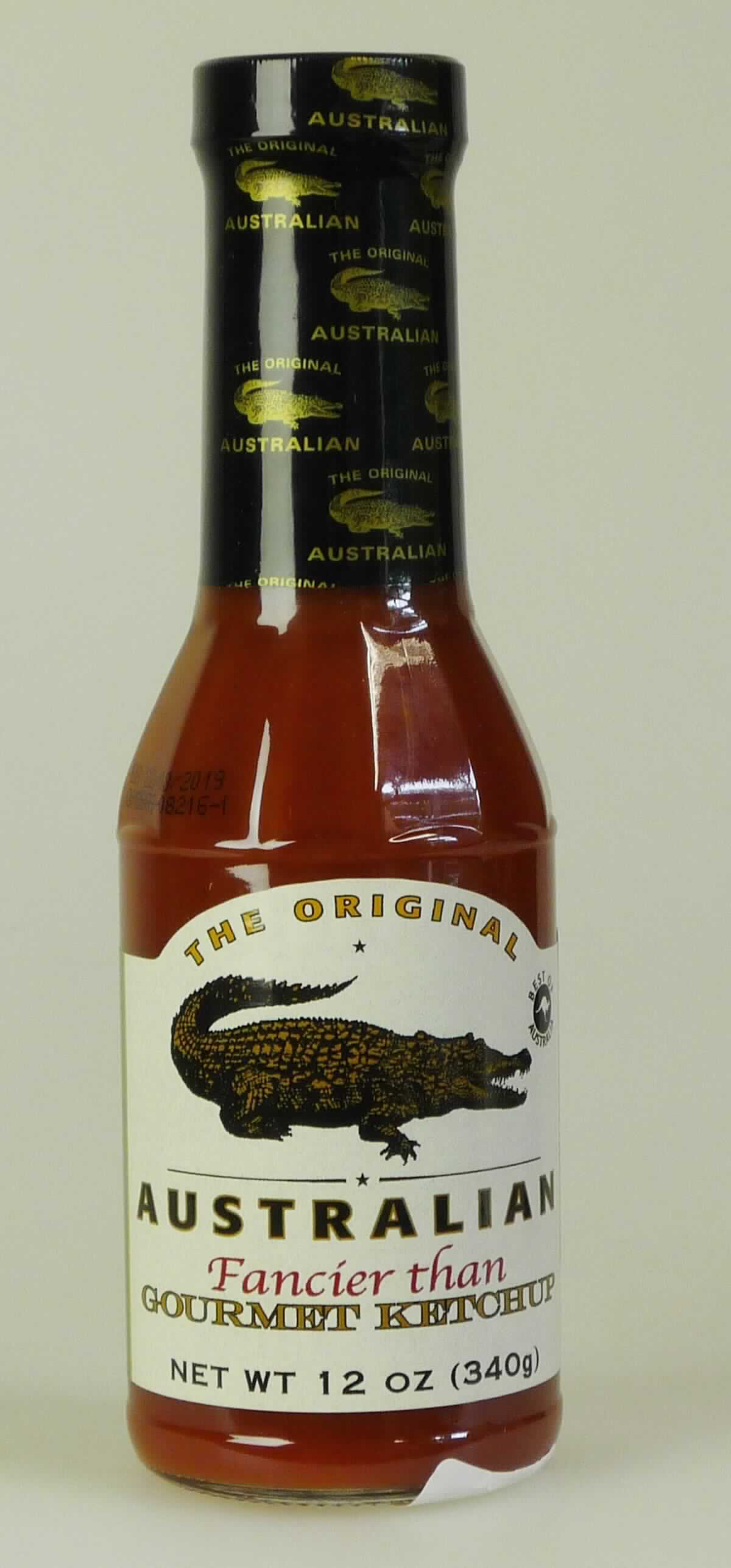 Zubereitete Würzsauce, Ketchup

Umschließung: Original-Glasflasche (355 ml) mit schwarzem Schraubverschluss, umlaufend etikettiert, mit 
Produktbezeichnung und weiteren Angaben (in englisch), zusätzlicher Aufkleber mit Angaben über Zutaten, 
Nährwertangaben  und weiteren Hinweisen (in deutsch).

Inhalt: Rotbraune, sämige, mit Zwiebelstückchen, Gewürzpartikeln und weiteren Bestandteilen durchsetzte 
Würzsauce mit der Konsistenz von Ketchup; Geschmack würzig, nach Tomate, süßlich, säuerlich, leicht 
scharf, einem Ketchup entsprechend.

Zubereitete Würzsoße, Tomatenketchup