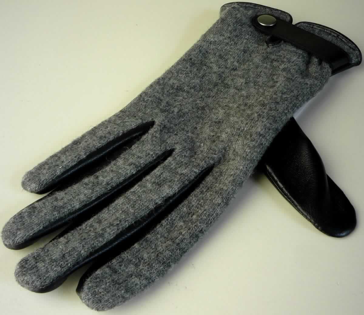 Handschuh aus Leder, sog. Damen Lederhandschuh, Foto siehe Anlage,
- als Fünffingerhandschuh gearbeitet,
- im Bereich der Innenhand, der Fingerinnenseiten, der Fingerzwischenräume und des Daumens aus laut Antrag
  Schafleder,
- im Bereich des Handrückens und der Fingeraußenseiten aus Gewirke aus laut Antrag Wolle und Polyamid
  (Spinnstoffe),
- in Höhe des Handgelenks elastisch verengt,
- am unteren Rand mit einer Aussparung versehen und mit einem Zierriegel aus Leder mit Druckknopf ausgestattet,
- gefüttert,
- ohne funktionelle Merkmale von Spezialsport- oder Schutzhandschuhen,
- im Hinblick auf den Umfang bestimmt das Leder den wesentlichen Charakter des Handschuhs.

"Bekleidungszubehör aus Leder, Fingerhandschuh, keine Spezialsport- oder Schutzhandschuh"