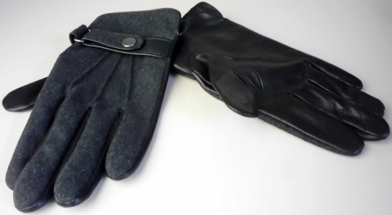 Handschuhe aus Leder, sog. Herren Lederhandschuhe, Foto siehe Anlage,
- als Fünffingerhandschuhe gearbeitet,
- im Bereich der Innenhand, der Fingerinnenseiten, der Fingerzwischenräume und des Daumens aus laut Antrag
  Schafleder,
- im Bereich des Handrückens und der Fingeraußenseiten aus Gewebe aus laut Antrag Polyester (Spinnstoff),
- in Höhe des Handgelenks mit einem Zierriegel aus Leder und Gewebe mit Druckknopf ausgestattet,
- am unteren Rand mit einem seitlichen Schlitz versehen,
- gefüttert,
- ohne funktionelle Merkmale von Spezialsport- oder Schutzhandschuhen,
- im Hinblick auf den Umfang bestimmt das Leder den wesentlichen Charakter der Handschuhe.

"Bekleidungszubehör aus Leder, Fingerhandschuhe, keine Spezialsport- oder Schutzhandschuhe"