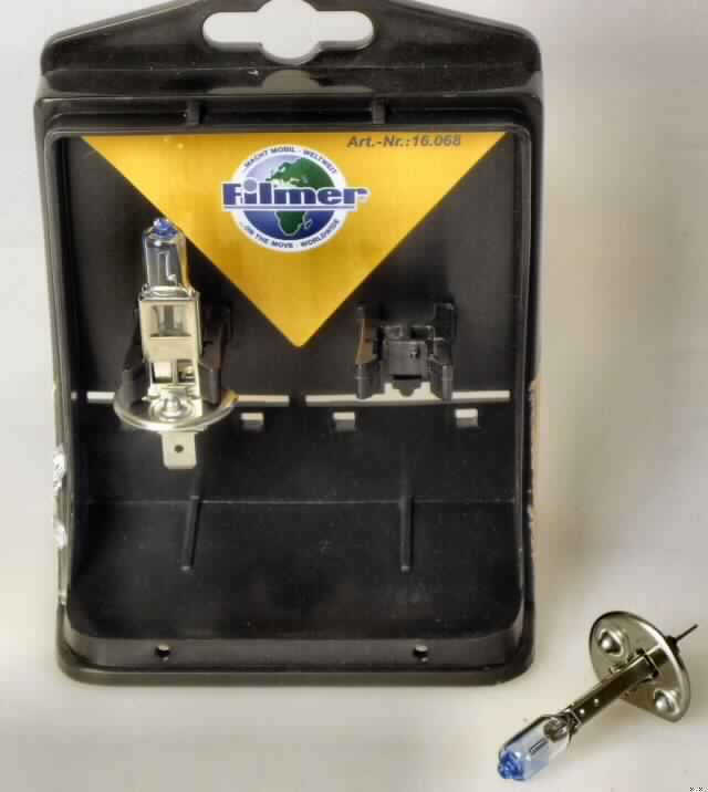 Halogenlampe
- aus einem mit Halogen gefüllten Glaskolben mit Wolfram-Glühwendel und P14.5S-Sockel,
- für eine Spannung von 12 Volt und eine Leistung von 55 Watt,
- zur Verwendung in Kfz-Scheinwerfern.
- zwei Stück gemeinsam in einer wiederverwendbaren Kunststoffbox verpackt.
(Abbildung siehe Anlage)

"Elektrische Wolfram-Halogen-Glühlampe, von der für Krafträder und andere Kraftfahrzeuge verwendeten Art; sog. Scheinwerferlampen-Set H1"