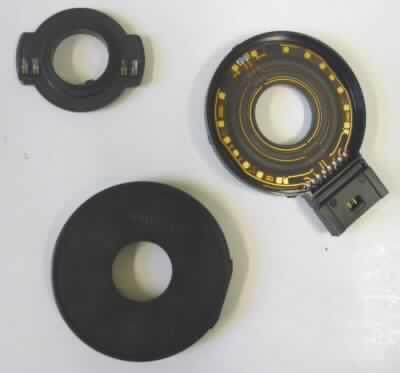 Potentiometer (Abbildung siehe Anlage),
- aus zwei Potentiometern und einem Thermistor (nicht miteinander verschaltet) in einem 
  spezifisch geformten Kunststoffgehäuse mit acht Anschlussstiften,
- für eine Leistung von weniger als 20 W,
- zur Positionsermittlung einer Antriebseinheit, sowie zum Überwachen der Betriebs- 
  temperatur.
Die Potentiometer üben die kennzeichnende Haupttätigkeit aus.

"Elektrischer Widerstand, kein Kohlemasse- oder Kohleschichtfestwiderstand, kein
 Drahtstellwiderstand (Kombination aus Potentiometer (kennzeichnende Haupttätigkeit) und
 Thermistor), für eine Leistung von 20 W oder weniger"