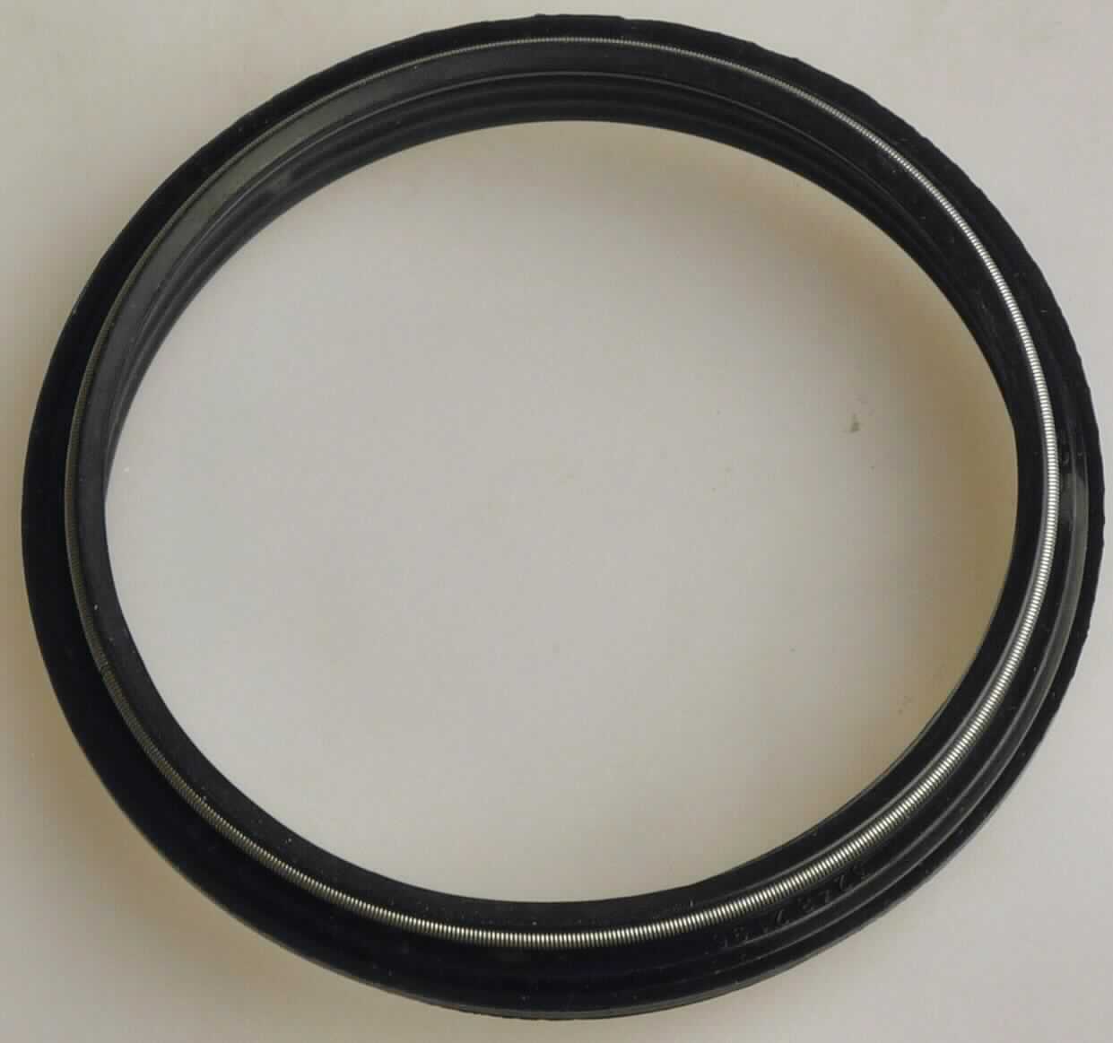 Federringdichtung, sog. Dilagbuchse / Seal, Vacuum (Teile-Nr.: 32482196), siehe Abbildung,

mechanische Dichtung bestehend aus mit Weichkautschuk beschichtetem Metall, einer Dichtlippe aus Weichkautschuk (hier EPDM-Kautschuk) und mit einem Federring versehen. 
Abmessungen:  
- Außendurchmesser: ca. 79 mm,
- Innendurchmesser: ca. 69 mm.

Die Ware ist als "mechanische Dichtung" einzureihen.