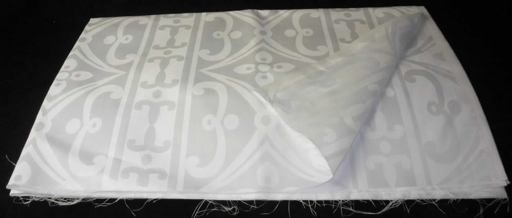 Jacquardgewebe, sog. Baumwollgewebe, Art. A92 SAB Damast weiß gebleicht, Foto siehe Anlage,
- als Meterware,
- lt. Antrag:
-- mit einer Breite von ca. 140 cm,
-- aus 100 % Baumwolle,
-- mit einem Quadratmetergewicht von 127 g,
- weder in Leinwand- noch in Köperbindung,
- gebleicht (weiß gefärbt).

"Gewebe aus Baumwolle, mit einem Anteil an Baumwolle von mehr als 85 GHT und einem Quadratmetergewicht 
 von weniger als 200 g, gebleicht, andere als in den Unterpositionen 5208 21 bis 5208 23 genannte"