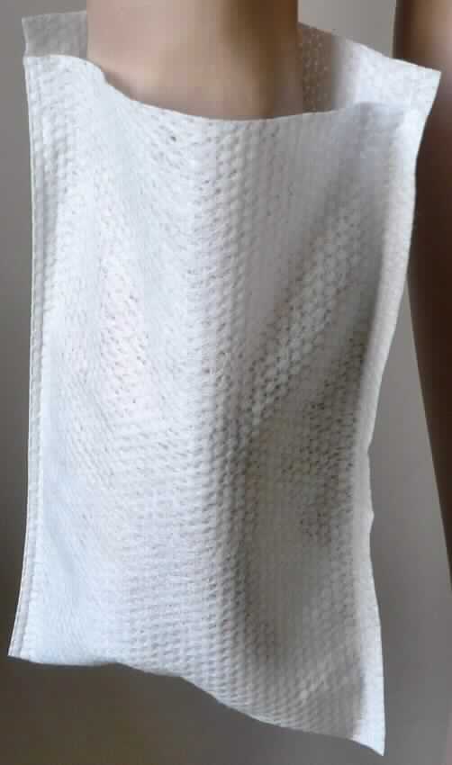 Einweg-Waschhandschuhe, sog. Waschhandschuhe aus Vlies grob, Foto siehe Anlage,
- in rechteckiger Form, laut Antrag mit den Abmessungen: 15 cm x 30 cm,
- laut Untersuchungsergebnis aus einem ca. 0,5 mm dicken, einfarbigen Vliesstoff aus Polyester und Viskose
  (beides Chemiefasern), 
- an einer Schmalseite umgeschlagen und durch Heißversiegeln an den beiden Längsseiten zu einem 
  Waschhandschuh zusammengefügt (somit konfektioniert),
- wird zur Körperpflege verwendet.

"Wäsche zur Körperpflege, aus Spinnstoffen, aus Chemiefasern, aus Vliesstoff"
