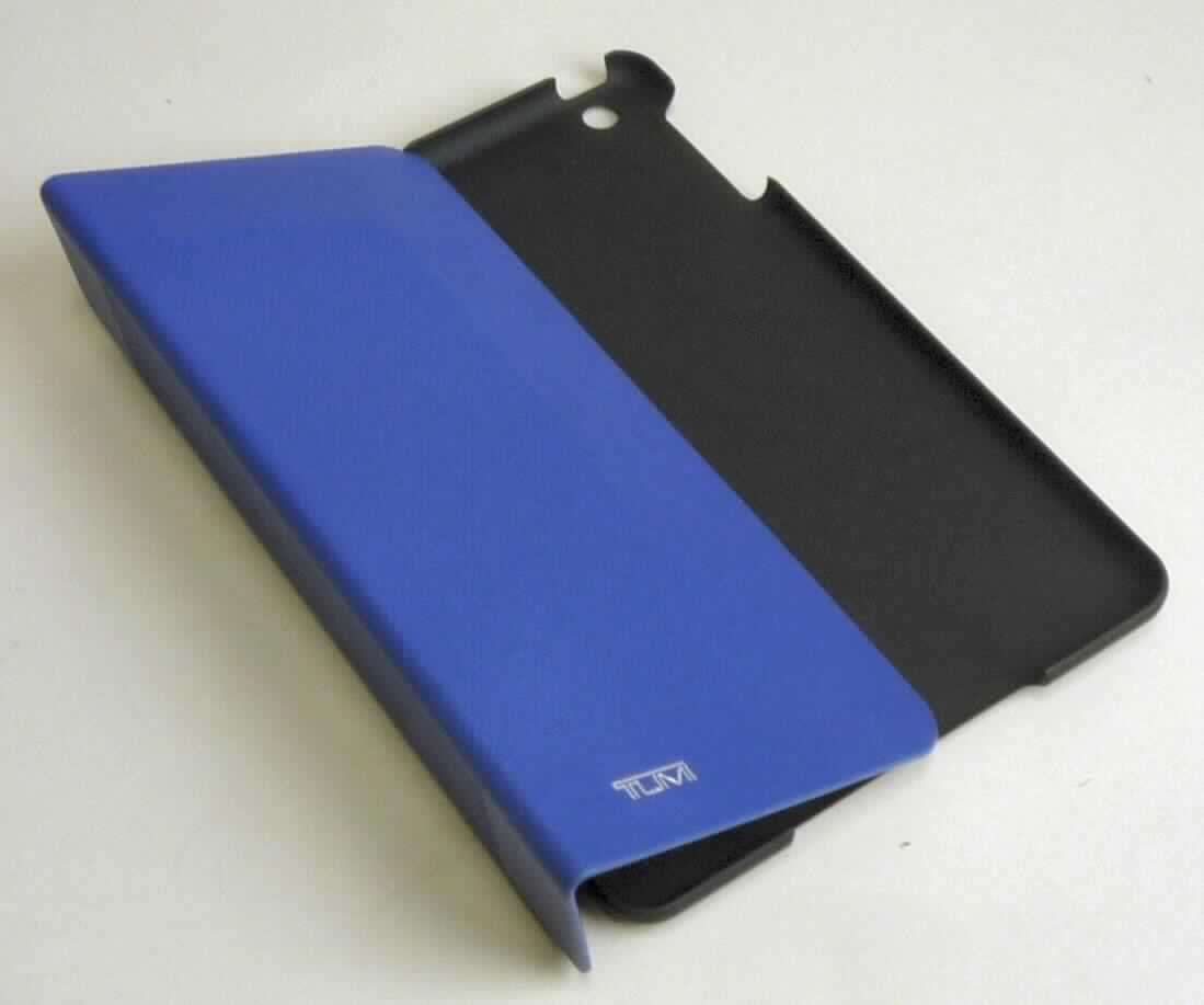 Etuiähnliches Behältnis, sog. Tumi Leather Snap Case for IPad mini, Art.-Nr. 014247ATL-RD, Abbildung siehe 
Anlage, 
- mit einer flächenmäßig überwiegenden, charakterbestimmenden Außenseite aus Leder (Deckel) und formge- 
  presstem Kunststoff (Kunststoffschale), 
- die Schale aus formgepresstem Kunststoff ist passgenau zur Aufnahme eines Tablet-PC gestaltet, 
- rechteckig, mit den Abmessungen von ca. 20,5 (L) x 14 (B) x 1 (T) cm, 
- ohne Verschluss, 
- zur Bedienung des IPads mit mehreren Öffnungen versehen, innen einseitig gefüttert, 
- dient dem Transport und der Aufbewahrung eines Tablet-Computers und kann zusätzlich aufgeklappt als Aufstell- 
  vorrichtung genutzt werden, 
- keine Hinweise auf Handarbeit, 
- verpackt in einer handelsüblichen Verkaufsumschließung. 

"Etuiähnliches Behältnis, anderes als in den Unterpositionen 4202 1110 bis 4202 3900 genannte, mit Außenseite 
 aus Leder, anderes als in der Unterposition 4202 9110 genannte, nicht handgearbeitet"