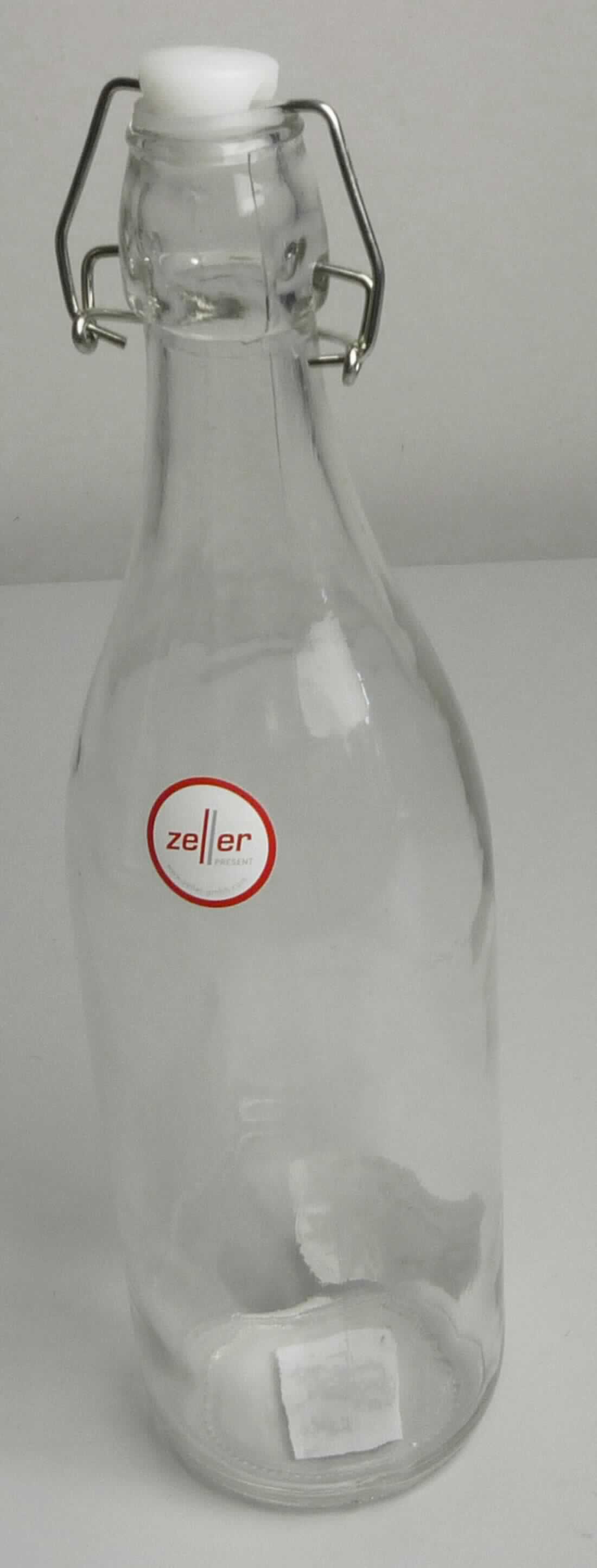 Flasche aus Glas, sog. Glasflasche mit Bügelverschluss, Art. Nr. 19713, Foto siehe Anlage,
- aus nicht gefärbtem Glas (nicht aus Glasröhren hergestellt), 
- mit einem Bügelverschluss aus unedlem Metall und einem Stopfen mit einem Dichtungsring aus Kunststoff,
- mit einem Fassungsvermögen (Nenninhalt) von 1000 ml,
- mit einer Höhe von ca. 32 cm und einem Durchmesser von ca. 8,5 cm,
- zur Aufnahme von Nahrungsmitteln oder Getränken.

"Flasche aus Glas, zu Transport- oder Verpackungszwecken, nicht aus Glasröhren hergestellt,
 aus nicht gefärbtem Glas, mit einem Nenninhalt von 1 l oder mehr, für Nahrungsmittel und Getränke"