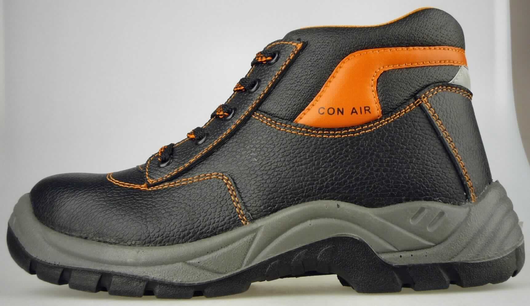 Sicherheitsschuhe (lt. Antrag: "Sicherheitsstiefel, Art.-Nr. 384175, schwarz-orange", Foto siehe Anlage)
- mit Laufsohlen aus Kunststoff,
- mit Oberteil (geschlossenes Blatt) aus Leder (den größten Teil der Außenfläche bildend) und Kunststoff
  (Spinnstoff mit einer mit bloßem Auge wahrnehmbaren Außenschicht aus Kunststoff),
- auf das Oberteil sind Stücke aus Leder und Kunststoff als Verstärkungsteile aufgesetzt,
- mit Schnürsenkelverschluss,
- mit einem Metallschutz in der Vorderkappe

"Schuhe mit Laufsohlen aus Kunststoff und Oberteil aus Leder, andere als in den UPos. 6403 1200 bis 6403 2000
 genannt, mit einem Metallschutz in der Vorderkappe"