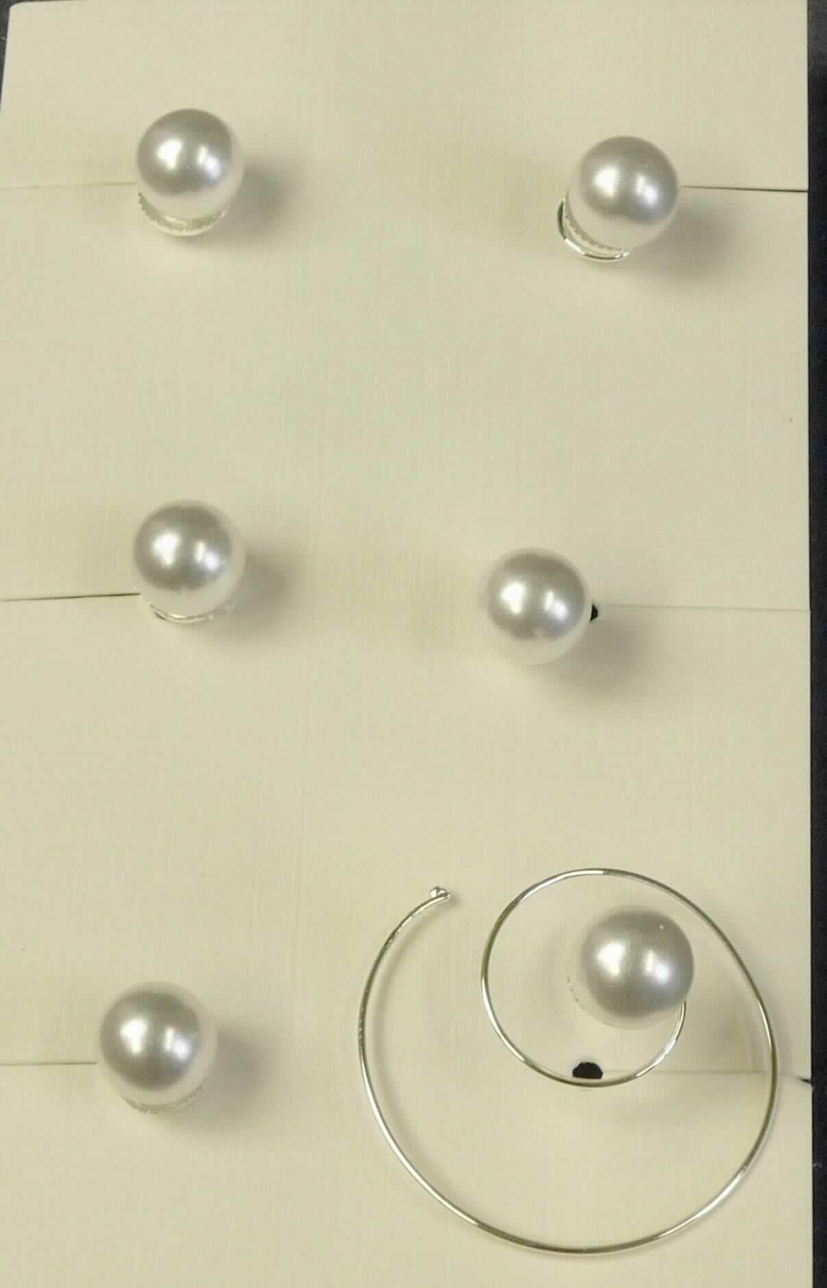 Es handelt sich um Haarschmuck in Gestalt eines spiralförmig gewundenen Drahtes, der auf der Oberseite mit einer angebrachten Perle aus Kunststoff verziert ist. 

Der Haarschmuck ist zu 6 Stück in einer klarsichtigen Kunststofftüte verpackt und als "haarnadelähnliche Ware" einzureihen.