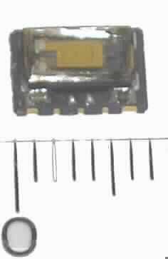 Temperaturkompensierter Oszillator (TCXO), JT75
- aus einer mit einem piezoelektrischen Quarzkristall, einer integrierten Schaltung und einem
  regelbaren Kondensator bestückten gedruckten Schaltung,
- in einem Metall-/Keramikgehäuse mit vier Anschlüssen.

"Elektrisches Gerät, mit eigener Funktion, in Kapitel 85 anderweit weder genannt noch
 inbegriffen, temperaturkompensierter Oszillator, bestehend aus einer gedruckten Schaltung,
 bestückt mit mindestens einem piezoelektrischen Quarzkristall und einem regelbaren
 Kondensator, in einem Gehäuse"