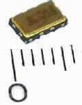 Piezoelektrischer Kristalloszillator, O 16.0 - JSS53
- mit einer festen Frequenz von 16,0 MHz, 
- aus einem mit aktiven und passiven  Bauelementen (Kondensator, monolithische
  integrierte Schaltung, Schwingquarz) bestückten Keramikträger,
- in einem Keramikgehäuse mit einer Kennzeichnung und 4 Anschlüssen.

"Elektrisches Gerät mit eigener Funktion, in Kapitel 85 anderweit weder genannt noch
 inbegriffen; Piezoelektrischer Kristalloszillator mit einer festen Frequenz in einem
 Frequenzbereich von 1,8 MHz bis 67 MHz, in einem Gehäuse"