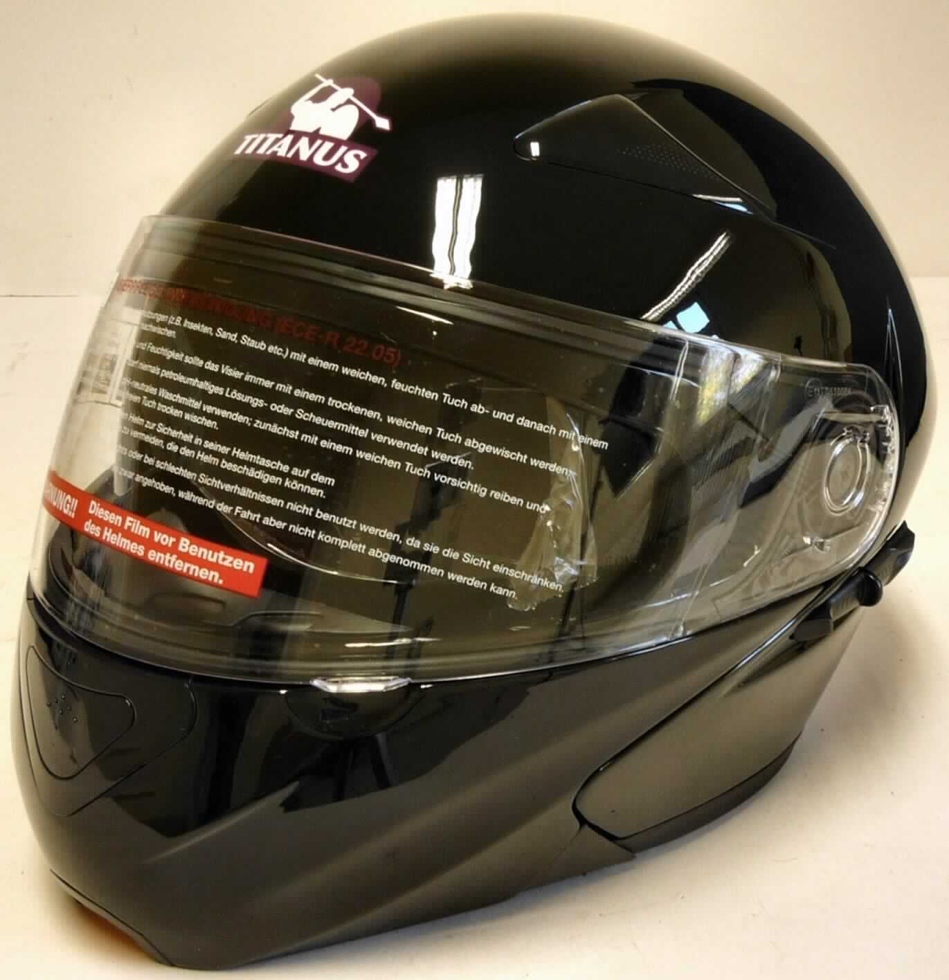 Sicherheitskopfbedeckung, sog. Helm, Foto siehe Anlage,
- in Form eines Motorradhelms (Integralklapphelm) in verschiedenen Farben und Größen,
- aus Kunststoff (lt. Verpackungsaufdruck Polycarbonat),
- mit einem Visier aus Kunststoff; mit einem zusätzlichen Sonnenschutzvisier,
- mit einstellbaren Ventilationsluftlöchern im Kinn- und Kopfbereich,
- innen gepolstert (teilweise herausnehm- und waschbar),
- mit einem Kinnriemen aus Spinnstoffen und einer Schnalle aus Kunststoff sowie Metall,
- zur Verwendung als Schutzhelm für Motorradfahrer,
- in einem zur Verpackung dieser Waren üblichen Beutel aus Spinnstoffen und einem 
  buntbedruckten Pappkarton mit einer Gebrauchsanweisung verpackt.

"Andere Kopfbedeckung, Sicherheitskopfbedeckung, aus Kunststoff"