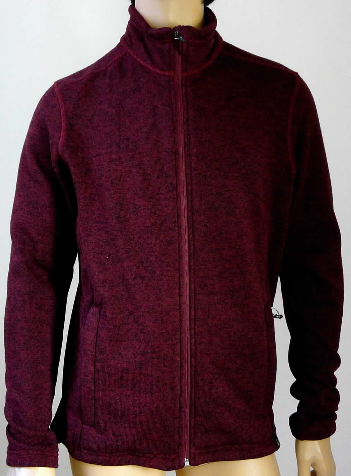 Blouson, sog. Strickjacke, Größe M, Foto siehe Anlage,
- aus ca. 1,7 mm dicken, einseitig (Innenseite) gerauten, buntgewirkten Gewirken (melierte Garne) aus laut 
  Antrag 100 % Polyester (synthetische Chemiefasern),
- über den Schritt reichend (Rückenlänge: ca. 76 cm),
- mit einem Stehkragen,
- vorn mit einer durchgehenden Öffnung mit einem bis in die Kragenspitzen reichenden Reißverschluss, am 
  Kragenrand mit einer kurzen Überlappung von links über rechts (Männerkleidung),
- mit langen Ärmeln, die über den unteren Rand des Kleidungsstücks hinausreichen,
- vorn mit zwei eingesetzten Taschen mit Reißverschluss unterhalb der Taille,
- am unteren Rand mit einem Tunnelzug zu verengen, 
- erfüllt die Merkmale zur Einreihung als Blouson, somit keine Strickjacke.

"Blouson, aus Gewirken, für Männer, aus Chemiefasern"