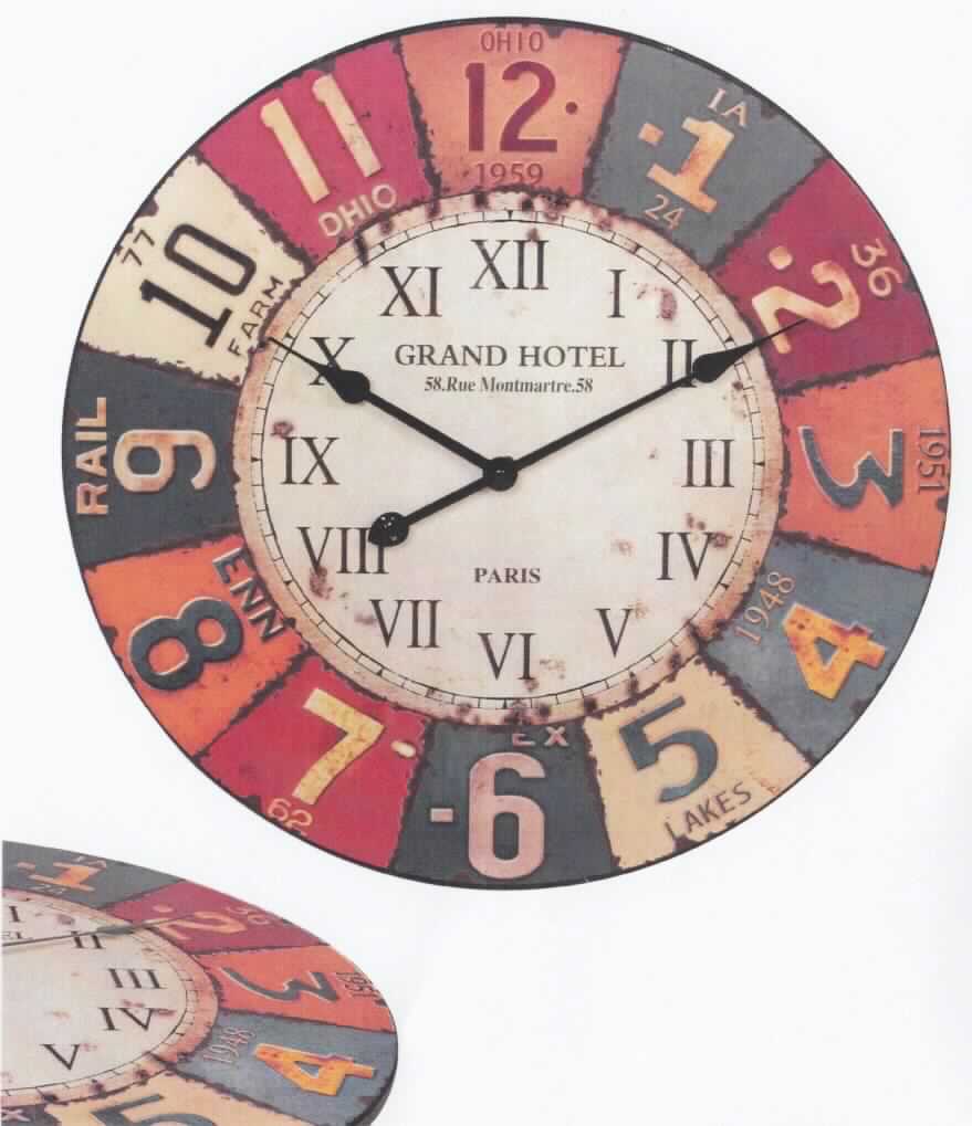 Bei der als Wanduhr Grand Hotel (Art. WL1.232) bezeichneten Ware handelt es sich um eine Uhr mit Kleinuhrwerk. Die mittels Batterie elektrisch betriebene Wanduhr mit einem Metallrahmen hat einen Durchmesser von ca. 60 cm, eine Dicke von ca. 1 cm und ist mit zwei Zeigern für die Anzeige von Stunden bzw. Minuten ausgestattet. Sie verfügt über ein Ziffernblatt aus ehemaligen Autokennzeichen und zusätzlich über römischen Ziffern.

Die Ware wird als "Uhr mit Kleinuhr-Werk, nicht von Positionen 9101, 9102 oder 9104 erfasst, elektrisch betrieben" eingereiht.
