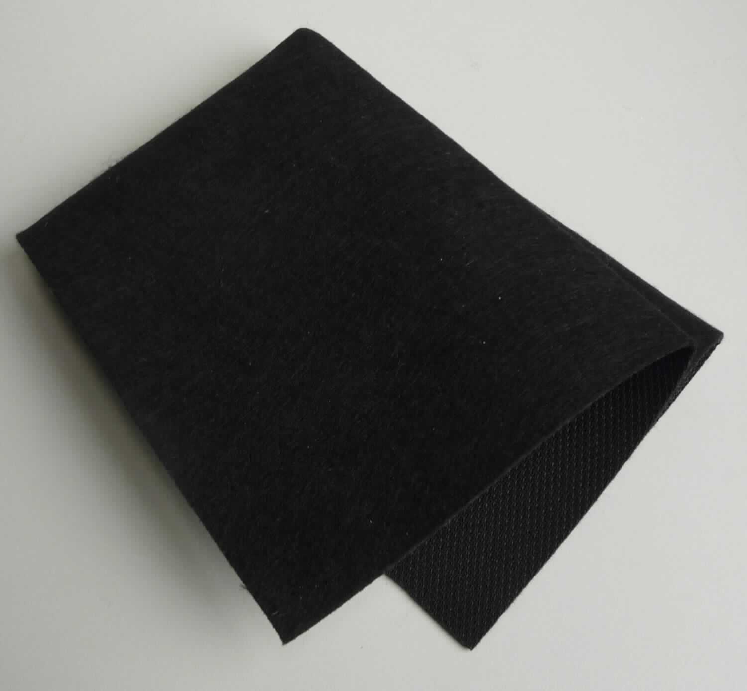 Textillaminat, sog. Kaschierverbundmaterial, Foto siehe Anlage
- rechteckig zugeschnitten, 
- zweilagig gearbeitet, mit:
-- einer Oberlage:
--- aus einem gefärbten Kettengewirke aus synthetischen Chemiefasern (laut Antrag: Polyester), 
--- ohne Flor- oder Schlingenoberfläche,
--- keine Elastomergarne oder Kautschukfäden enthaltend,
-- einer Unterlage aus einem Vliesstoff aus synthetischen Chemiefasern (laut Antrag: Polyester)
- das Kettengewirke, das die Schauseite bildet, ist insbesondere im Hinblick auf die Verwendung als Automobil-
  Interieur charakterbestimmend.

"Kettengewirke, anderes als solche der Positionen 6001 bis 6004, aus synthetischen Chemiefasern, anderes
 als in der Unterposition 6005 35 genannte, gefärbt"