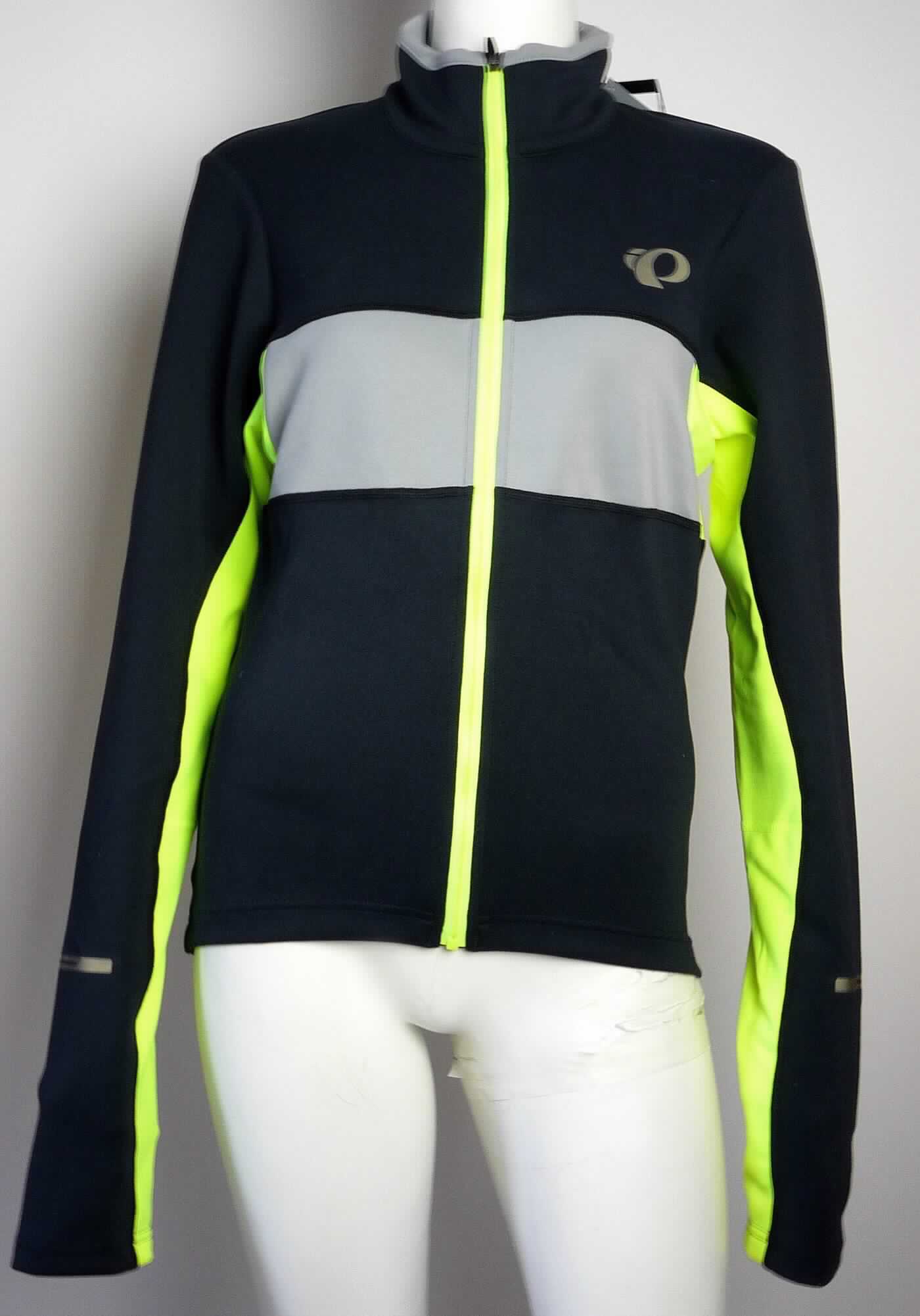 Jacke, sog. Thermal Radjersey, Art. 11121624, Größe M, Foto siehe Anlage,
- aus ca. 1,1 mm dicken, doppellagigen, durch Kleben miteinander verbundenen Flächenerzeugnissen mit einer
  Außen- und Innelage aus verschiedenen einfarbigen Gewirken aus laut Antrag 92 % Polyester und 8 % Elasthan 
  (beides synthetische Chemiefasern) sowie unterhalb der Achseln, im mittleren Rückenbereich und unterhalb
  der Arme aus ca. 1,1 mm dicken, einseitig (Innenseite) gerauten, einfarbigen Gewirken aus laut Antrag
  100 % Polyester,
- über die Taille reichend (Rückenlänge: ca. 68 cm); vorn bis zu ca. 6 cm kürzer und hinten abgerundet gearbeitet,
- ungefüttert,
- mit einem Stehkragen, 
- vorn mit einer durchgehenden Öffnung mit einem bis in die Kragenspitzen reichenden Reißverschluss,
- ohne Hinweise auf den Trägerkreis (unisex),
- mit langen Ärmeln,
- hinten mit einer aufgesetzten, fünfgeteilten, offenen Tasche unterhalb der Taille, 
- in Längsbahnen gearbeitet, 
- am unteren Rand durch Umschlagen und Festnähen gesäumt.

"Jacke, aus Gewirken, für Frauen, aus synthetischen Chemiefasern"