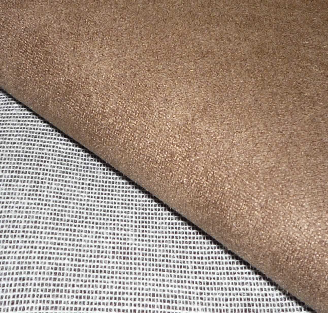 Textillaminat, Art. NUBUK, Foto siehe Anlage,
- als Meterware, laut Antrag mit einer Breite von mehr als 30 cm,
- laut Untersuchungsergebnis: 
-- aus zwei mit ihrer ganzen Fläche aufeinander liegenden und so miteinander durch Kleben verbundenen Lagen: 
--- mit einer oberen Lage (Schauseite):
---- aus einem gerauten, buntgewebten Gewebe in Atlasbindung aus ungezwirnten, nicht hochfesten Garnen,
---- mit Kettgarnen aus synthetischen Filamenten (lt. Antrag: Polyester),
---- mit Schussgarnen aus dicken, synthetischen Filamenten (lt. Antrag: Polyester) und synthetischen Mikro-
     Spinnfasern (lt. Antrag: Polyester),
---- mit einem Gesamtanteil an:
----- synthetischen Filamenten von ca. 60 GHT,
----- synthetischen Spinnfasern von ca. 40 GHT,
--- mit einer Unterlage  aus einem weißen Gewebe in Leinwandbindung aus Polyester-Spinnfasern (synthetische
     Spinnfasern), 
- insbesondere im Hinblick auf die Bedeutung in Bezug auf die Verwendung verleiht das die Schauseite bildende 
  Gewebe der Ware ihren wesentlichen Charakter.

"Gewebe aus Garnen aus synthetischen Filamenten, anderes als in den Unterpositionen 5407 10 bis 5407 84 
 genannte, buntgewebt"