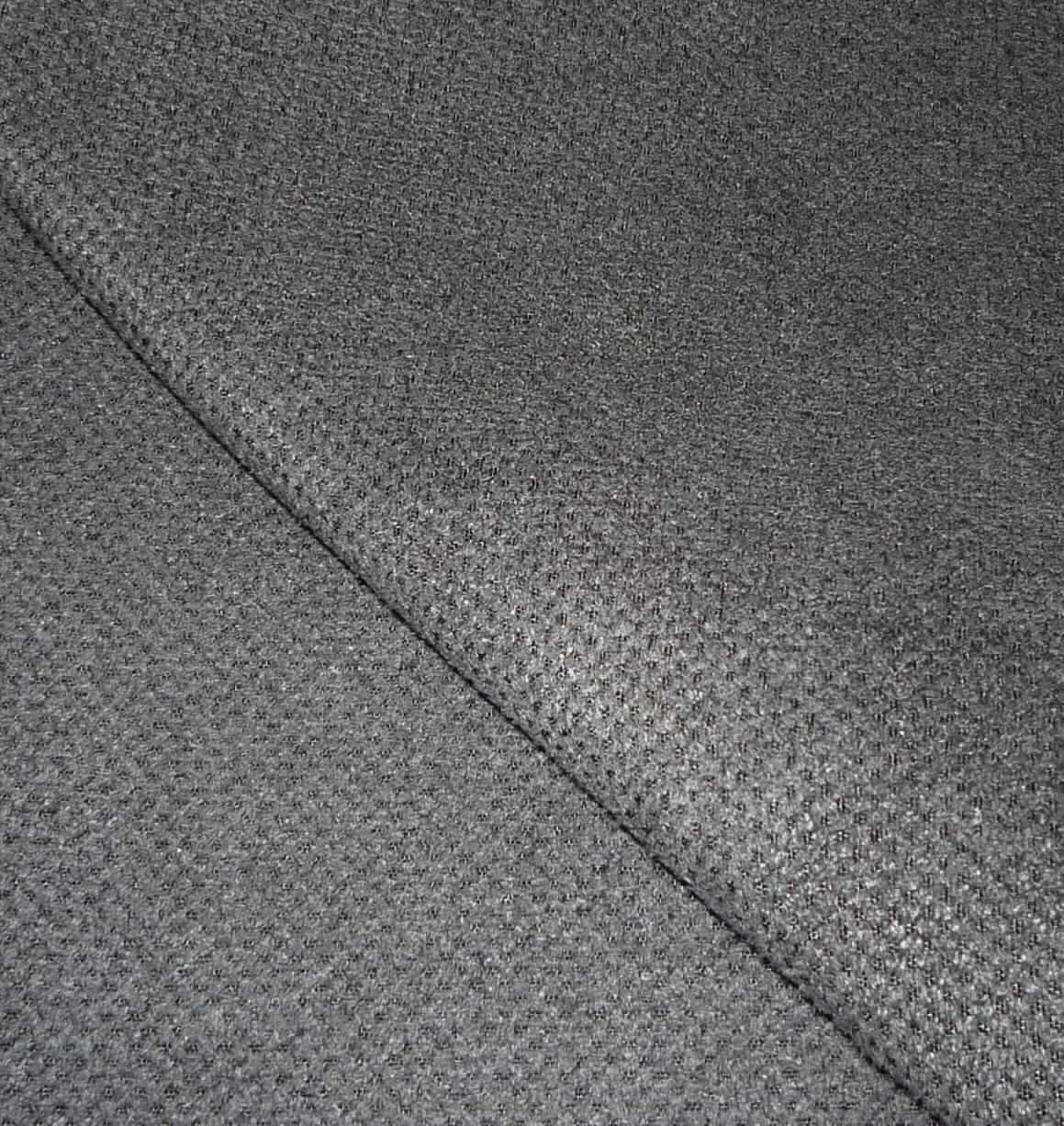 Textillaminat, Art. Gewebe HC, Foto siehe Anlage,
- als Meterware, laut Antrag mit einer Breite von mehr als 30 cm,
- laut Untersuchungsergebnis: 
-- aus zwei mit ihrer ganzen Fläche aufeinander liegenden und so miteinander durch Kleben verbundenen Lagen: 
--- mit einer oberen Lage (Schauseite):
---- aus einem gerauten, buntgewebten Gewebe in Atlasbindung aus ungezwirnten, nicht hochfesten Garnen,
---- mit Kettgarnen aus synthetischen Filamenten (lt. Antrag: Polyester),
---- mit Schussgarnen aus dicken, synthetischen Filamenten (lt. Antrag: Polyester) und synthetischen Mikro-
     Spinnfasern (lt. Antrag: Polyester),
---- mit einem Gesamtanteil an:
----- synthetischen Filamenten von ca. 60 GHT,
----- synthetischen Spinnfasern von ca. 40 GHT,
--- mit einer Unterlage aus einem weißen Gewebe in Leinwandbindung aus Polyester-Spinnfasern (synthetische
     Spinnfasern), 
- insbesondere im Hinblick auf die Bedeutung in Bezug auf die Verwendung verleiht das die Schauseite bildende 
  Gewebe der Ware ihren wesentlichen Charakter.

"Gewebe aus Garnen aus synthetischen Filamenten, anderes als in den Unterpositionen 5407 10 bis 5407 84 
 genannte, buntgewebt"