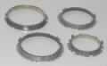 Außensynchronring, Foto siehe Anlage,
- zahnradähnliche Erzeugnisse aus unedlem Metall (laut Antrag nicht gesenkgeschmiedet),
- in diversen Ausführungen mit unterschiedlichen Dimensionen,
- mit einer Dicke von ca. 0,9 cm - 1 cm,
- auf der Außenseite mit einem unterbrochenen Zahnkranz ausgerüstet; weist auf der
  Innenseite spezielle Vorsprünge oder Vertiefungen auf,
- stellt sich als Teil eines Synchronisationssystems innerhalb eines Schaltgetriebes dar, das
  im Kraftfahrzeug zur Angleichung (Synchronisierung) von unterschiedlichen Drehzahlen
  beim Schaltvorgang dient,
- laut ergänzenden Antragsangaben nicht für die industrielle Montage,
- erkennbar zur ausschließlichen Verwendung als Teil des Schaltgetriebes in Kraftfahrzeugen bestimmt.

"Teil für Kraftfahrzeuge der Positionen 8701 bis 8705, Teil eines Schaltgetriebes (Außensynchronring), 
nicht für die industrielle Montage, nicht gesenkgeschmiedet"