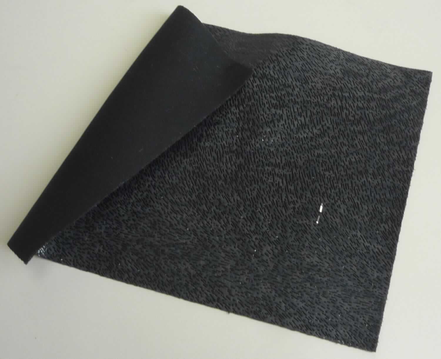 Textillaminat, sog. Obermaterial, Foto siehe Anlage,
- als Meterware; laut Antrag mit einer Breite von 127 cm,
- laut Untersuchungsergebnis:
-- aus zwei mit ihrer ganzen Fläche aufeinander liegenden und so miteinander durch Kleben verbundenen Lagen:
--- mit einer Oberlage (Schauseite):
---- aus einem musterbildend bedruckten und geschmirgelten Kettengewirke,
---- aus synthetischen Chemiefasern (laut Antrag: Polyester),
---- mit einem Anteil an Elastomergarnen laut Antrag von 5 GHT,
---- keine Kautschukfäden enthaltend,
--- mit einer Unterlage:
---- aus einem gefärbten Kuliergewirke (Interlock),
---- aus synthetischen Chemiefasern (laut Antrag: Polyester),
---- keine Elastomergarne oder Kautschukfäden enthaltend,
- laut Antrag zur Herstellung von Schuhen,
- insbesondere im Hinblick auf den Verwendungszweck verleiht das die Schauseite bildende Kettengewirke der
  Ware ihren wesentlichen Charakter.

"Gewirke, mit einer Breite von mehr als 30 cm, mit einem Anteil an Elastomergarnen von 5 GHT, anderes als 
 solche der Position 6001, keine Kautschukfäden enthaltend, aus synthetischen Chemiefasern"