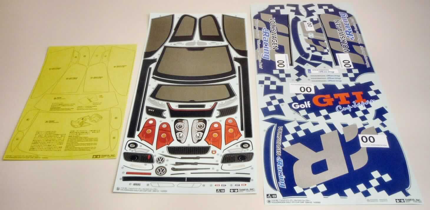 Das Set aus zwei Aufklerbebögen mit den Abmessungen ca. 42 x 20 cm und 48 x 21 cm enthält alle Aufkleber für den Bausatz des maßstabsgetreu verkleinerten Modells "Tamiya VW Golf GTI Cup". Mit Hilfe der Aufkleber bekommt das Modell innen und vor allem außen sein spezielles Aussehen. Die Aufkleber sind auf Grund ihrer Form und der Aufschriften nur für dieses Modell verwendbar.

Sie werden als ein "erkennbares Teil für ein maßstabsgetreu verkleinertes Modell zum Zusammenbauen" eingereiht.