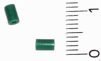 Glaspressling,
- in Form eines zylindrischen Glaskörpers, mittig mit einer Bohrung (Durchmesser ca. 2,4 mm, 
  Höhe ca. 3 mm, Bohrungsdurchmesser ca. 1,1 mm), 
- nach Einschmelzen zur Verwendung zur Isolation zwischen Massestift und Sockel einer
  Durchführung bei verschiedenen Gehäusen für elektronische Waren.

"Isolierteile für elektrische Geräte, ganz aus Isolierstoffen, nicht aus keramischen Stoffen oder Kunststoffen"