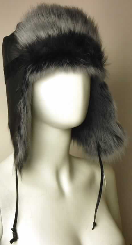 Kopfbedeckung, sog. Frauenmütze "Nappa Finish Cygnet Hat", Foto siehe Anlage, 
- durch Zusammennähen von Stücken aus Pelzfellen von Schafen (laut Etikett) 
  annähernd der Kopfform entsprechend hergestellt, 
- die Fellseite bildet die Innenseite und die Lederseite die Außenseite der Kopfbedeckung,
- an beiden Seiten mit ausgearbeiteten Ohrklappen versehen, die mittels zweier Lederbänder 
  unter dem Kinn zusammengebunden werden können, 
- an der Vorderseite umgeschlagen und festgenäht, wodurch die Fellseite sichtbar ist.

"Kopfbedeckung, keine Sicherheitskopfbedeckung, aus Pelzfellen"