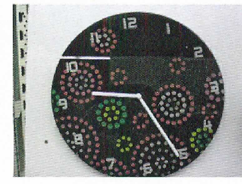 Wanduhr, Art. Nr. 216.362, s. Foto.
Bei der Ware handelt es sich um eine Wanduhr für den Innenbereich aus Glas, bestehend aus
- einem batteriebetriebenen Uhrwerk (kein Kleinuhr-Werk), das in einem ca. 55 mm x  55 mm x 15 mm großen 
  Gehäuse untergebracht ist, 
- einem Stunden- und Minutenzeiger aus Kunststoff sowie 
- einem runden Zifferblatt,
- Durchmesser: 40 cm.

Die Ware ist als "andere als in den Positionen 9101 bis 9104 erfasste, elektrisch betriebene Wanduhr" einzureihen.