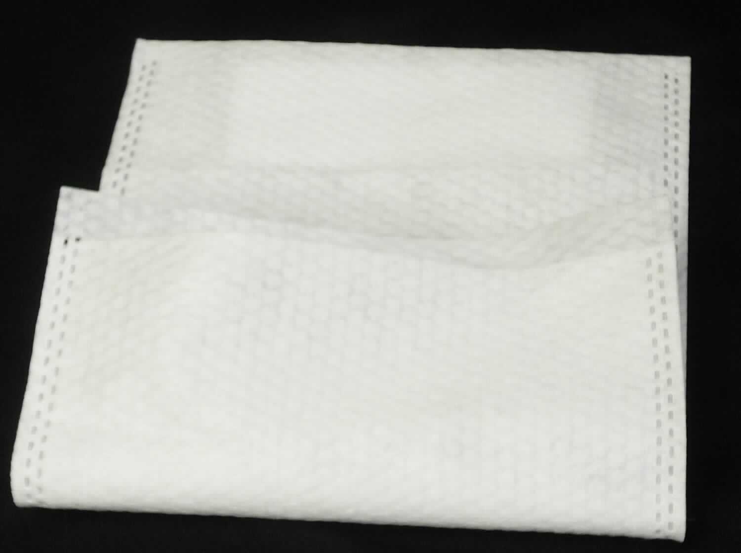 Waschhandschuh, Foto siehe Anlage,
- von rechteckiger Form, mit den Abmessungen laut Antrag 23 cm x 14,5 cm,
- aus ca. 0,5 mm dicken, einfarbigen Vliesstoffen der Position 5603 aus augenscheinlich synthetischen 
  Chemiefasern, 
- an einer Schmalseite umgeschlagen und an den beiden Längsseiten zusammengeschweißt (somit konfektioniert),
- wird zur Körperpflege verwendet.

"Wäsche zur Körperpflege (Waschhandschuh), aus Spinnstoffen, aus Chemiefasern, aus Vliesstoffen"