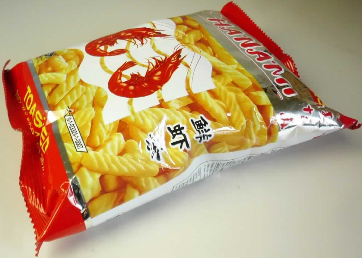 Garnelen-Cracker

Beschaffenheit des vorgelegten Warenmusters (in Originalumschließung):
Bedruckter und etikettierter Kunststoffschlauchfolienbeutel mit Angaben zum Erzeugnis (Garnelen-Cracker; 
60 g) und zu den Zutaten, darin hellbraune, leicht gebogene, aufgeblähte, knusprige, spröde, geriffelte, 
ca. 4 - 5 cm lange, 0,8 cm breite und 0,8 cm dicke Gebäckstäbchen (augenscheinlich durch Extrusion 
hergestellt), Geruch leicht fischig, Geschmack nach würzigem Knabbergebäck mit Garnelenaroma. 

Gehalt an Erzeugnissen gemäß Anmerkung 1 a) zu Kapitel 19: 20 GHT oder weniger (nach den Antragsangaben) 
Stärke/Glucose*: 50 bis weniger als 75 GHT 
Saccharose/ Invertzucker/Isoglucose**: 0 bis weniger als 5 GHT 
Milchfett und Milchprotein: nach der Zutatenliste nicht enthalten
 
*: festgestellt gemäß VO (EG) 900/2008, VO (EU) 118/2010
**: festgestellt gemäß VO (EG) 900/2008

Backware, extrudiertes Erzeugnis, gesalzen oder aromatisiert