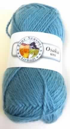 Garn (lt. Antrag: "Handstrickgarn - Osaka uni", siehe Foto)
- aus synthetischen Spinnfasern (lt. Antrag: Polyacryl),
- in Aufmachungen für den Einzelverkauf (Knäuel, mit einem Gewicht von 50 g),
- gezwirnt, 
- mit einer S-Drehung als letzter Drehung (kein Nähgarn),
- mit einem Titer von 3846 dtex (kein Bindfaden der Position 5607),
- gefärbt