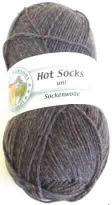 Garn (lt. Antrag: "Handstrickgarn - Hot Socks uni 50 g", siehe Foto)
- aus ca. 75 GHT Wolle und 25 GHT synthetischen Spinnfasern (lt. Antrag: Polyamid),
- in Aufmachungen für den Einzelverkauf (Knäuel, mit einem Gewicht von 50 g),
- gezwirnt (in S-Drehung),
- mit einem Titer von 2380 dtex, 
- nicht mit Metalldraht verstärkt (kein Bindfaden der Position 5607),
- meliert