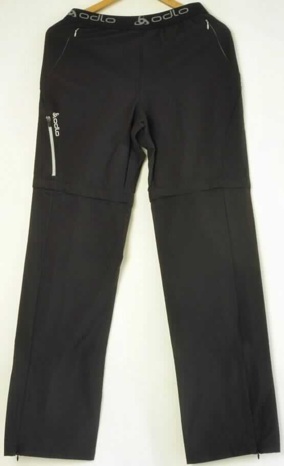 Lange Hose, sog. Pants MF Speed Light, Art. 525061, Größe 36, Foto siehe Anlage,
- aus ca. 0,4 mm dicken, einfarbigen Geweben aus laut Antrag 94 % Polyamid und 6 % Elasthan (beides 
  synthetische Chemiefasern),
- in der Taille abschließend, mit einem elastischen Taillenbund aus buntgewebten Geweben,
- unterhalb des Taillenbundes mit einer angedeuteten Patte ohne Eingriffsmöglichkeit (Verschlussattrappe); 
  ohne Öffnung und ohne Verschluss; ohne Hinweise auf den Trägerkreis (unisex),
- mit langen Hosenbeinen, die oberhalb der Knie durch einen Reißverschluss abgetrennt werden können; somit 
  kann die Hose auch als kurze Hose getragen werden,
- mit drei eingesetzten Taschen mit Reißverschluss,
- an beiden Seiten mit einem vom Beinabschluss ausgehenden, ca. 24 cm hoch reichenden Reißverschluss; 
  an den Beinabschlüssen durch Umschlagen und Festnähen gesäumt,
- keine Arbeits- und Berufskleidung.

"Lange Hose, aus Geweben, für Frauen, aus synthetischen Chemiefasern, keine Arbeits- und
 Berufskleidung, nicht nach dem Batikverfahren handbedruckt"