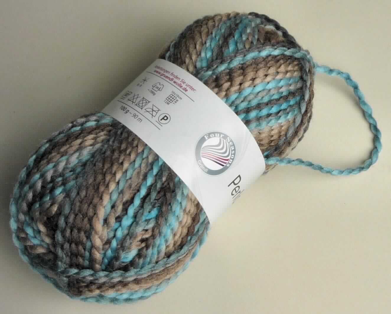 Gimpe, sog. Handstrickgarn Perla Color, Art.-Nr. 3354, Foto siehe Anlage,
- als Meterware im Knäuel, laut Antrag mit einer Länge von ca. 90 m,
- lt. Untersuchungsergebnis:
-- mit einer Seele aus einem Dochtgarn aus synthetischen Chemiefasern (laut Antrag: Polyester),
-- in weiten Windungen mit einem dünnen Garn aus synthetischen Chemiefasern (laut Antrag: Polyester) 
   umwickelt.

"Gimpe"