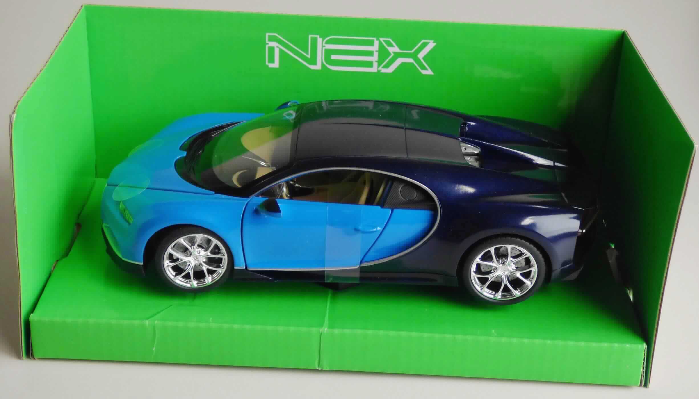 Modellfahrzeug, sog. "Bugatti Chiron, 2fach, 4er Set, Art. 12274"
- im Spritzgussverfahren hergestelltes Modell eines Bugatti Chiron im Maßstab 1:24 - 27
  - lt. Verpackungsangabe
- in den Abmessungen von ca. 19 x 9 x 5 cm
- mit einer Karosserie aus hell- und dunkelblau lackiertem Metall, im Spritzgussverfahren hergestellt
- mit Unterboden, Innenraum, Scheiben sowie Anbauteilen und Rädern aus Kunststoff 
- mit aufklappbaren Türen und Motorhaube
- mit lenkbaren Vorderrädern
- ohne Motorantrieb
- dient der spielerischen Unterhaltung von Kindern
- in einer Showbox für den Einzelverkauf aufgemacht.

Auf Grund des Gesamteindrucks bestimmt das Metall den Charakter der aus verschiedenen Stoffen bestehenden Ware.

Die Ware ist als "anderes als zuvor von der Position 9503 erfasstes Modell, im Gussverfahren hergestelltes Miniaturmodell aus Metall" einzureihen.
