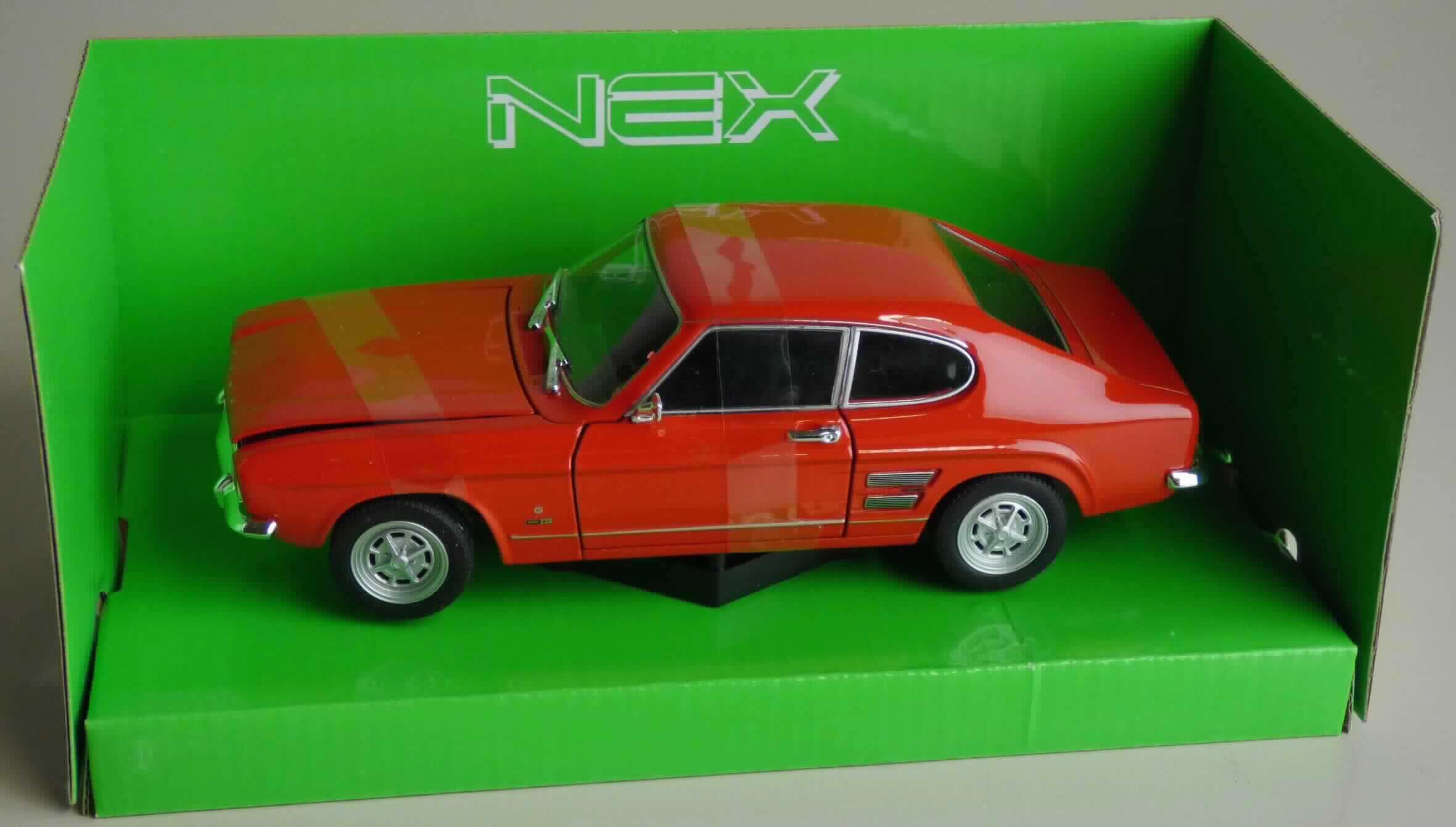 Modellfahrzeug, sog. "Ford Capri (1969), 2fach, 4er Set, Art. 12276"
- im Spritzgussverfahren hergestelltes Modell eines Ford Capri im Maßstab 1:24 - 27 
  - lt. Verpackungsangabe
- in den Abmessungen von ca. 17,5 x 7,1 x 5,2 cm
- mit einer Karosserie aus rot lackiertem Metall, im Spritzgussverfahren hergestellt
- mit Unterboden, Innenraum, Scheiben sowie Anbauteilen und Rädern aus Kunststoff 
- mit aufklappbaren Türen und Motorhaube
- mit lenkbaren Vorderrädern
- ohne Motorantrieb
- dient der spielerischen Unterhaltung von Kindern
- in einer Showbox für den Einzelverkauf aufgemacht.

Auf Grund des Gesamteindrucks bestimmt das Metall den Charakter der aus verschiedenen Stoffen bestehenden Ware.

Die Ware ist als "anderes als zuvor von der Position 9503 erfasstes Modell, im Gussverfahren hergestelltes Miniaturmodell aus Metall" einzureihen.